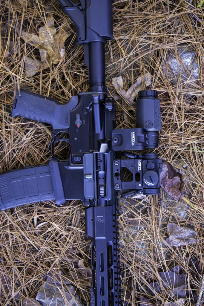 AR-15 with tactical optics setup – red dot, magnifier, and thermal mounted